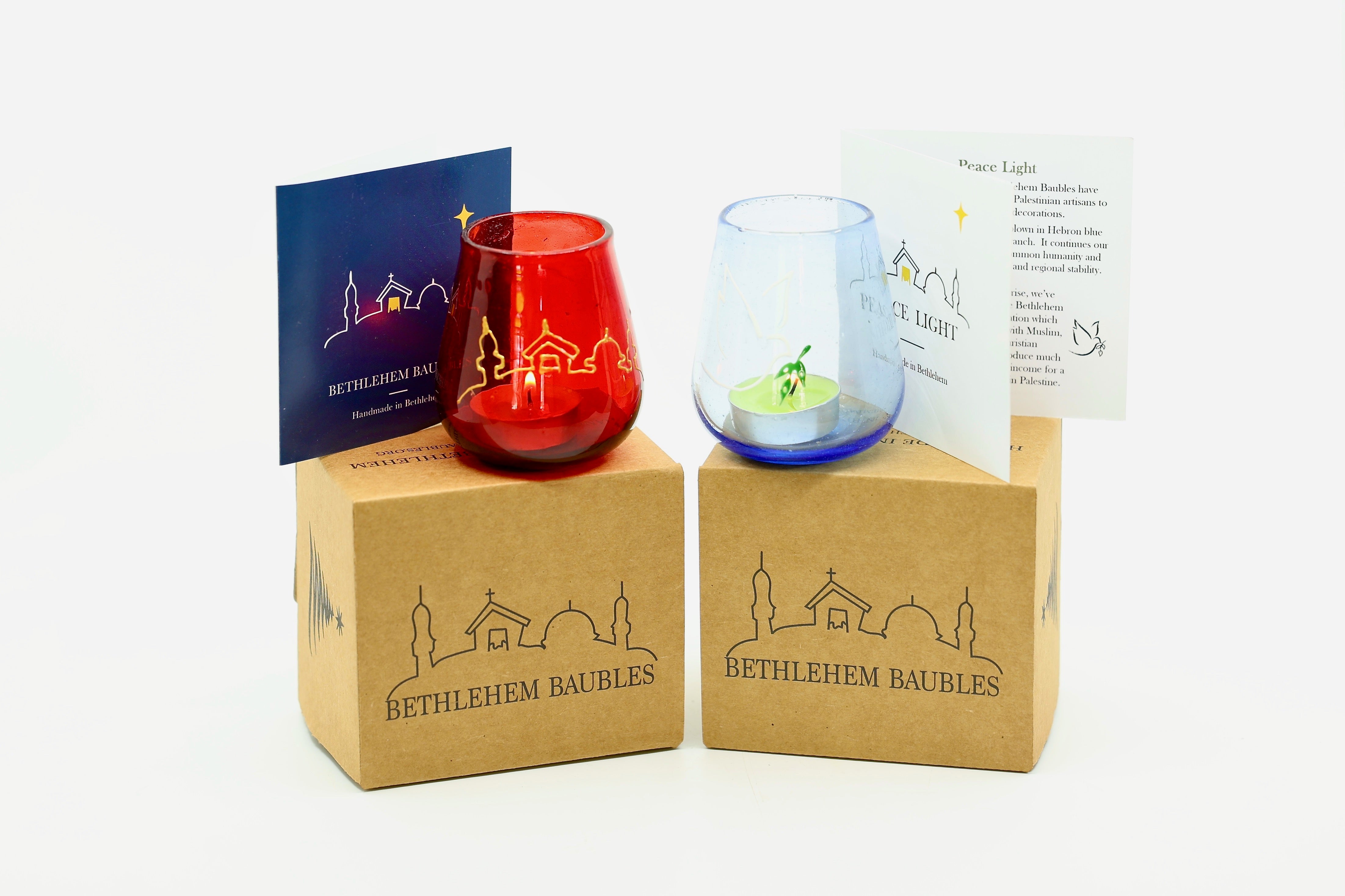 Peace lights bright red with gold Bethlehem skyline and ice blue with white dove and olive branch.