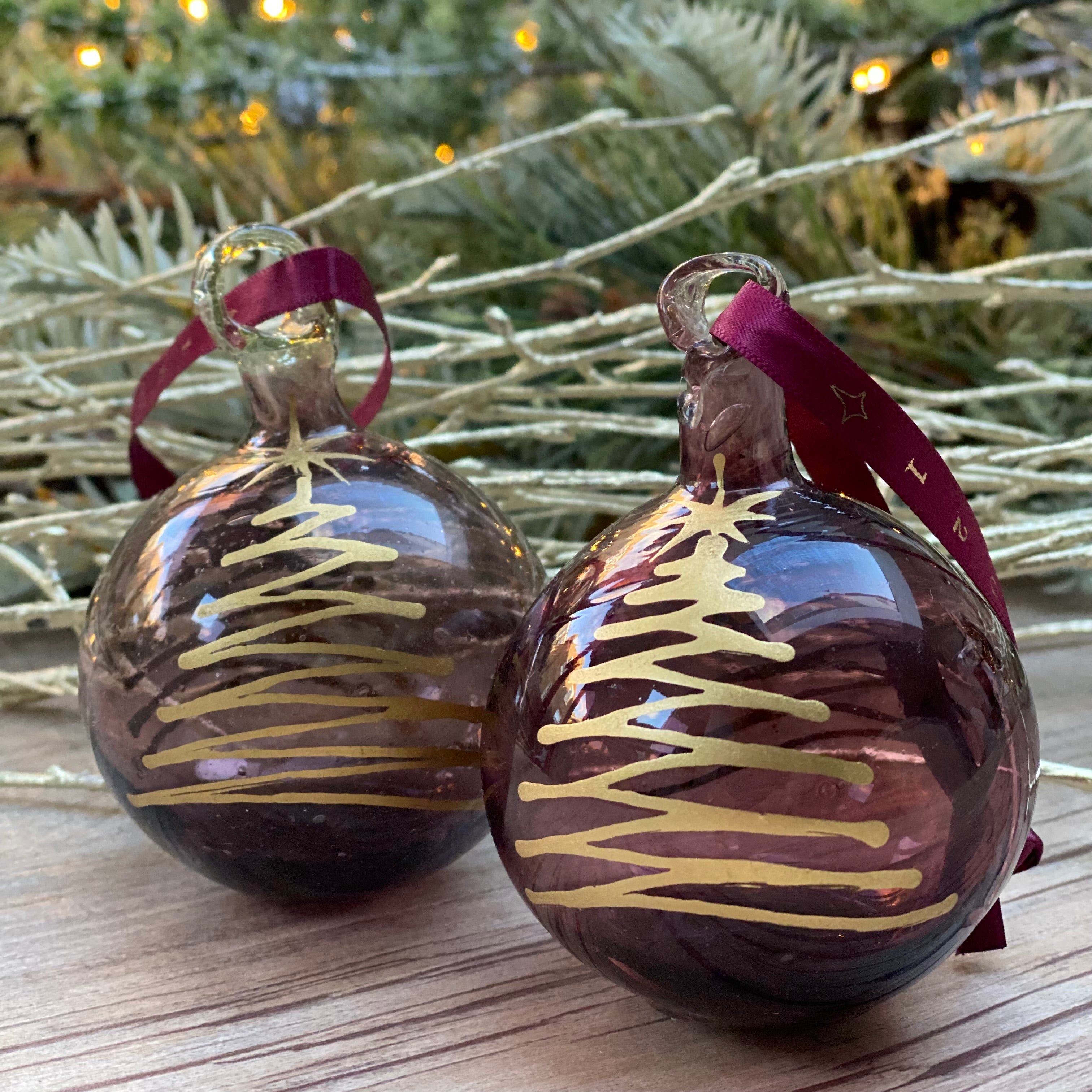 Bethlehem Baubles plum coloured glass bauble painted with gold Christmas tree