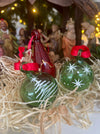 Green Christmas ornament with white stars, group view